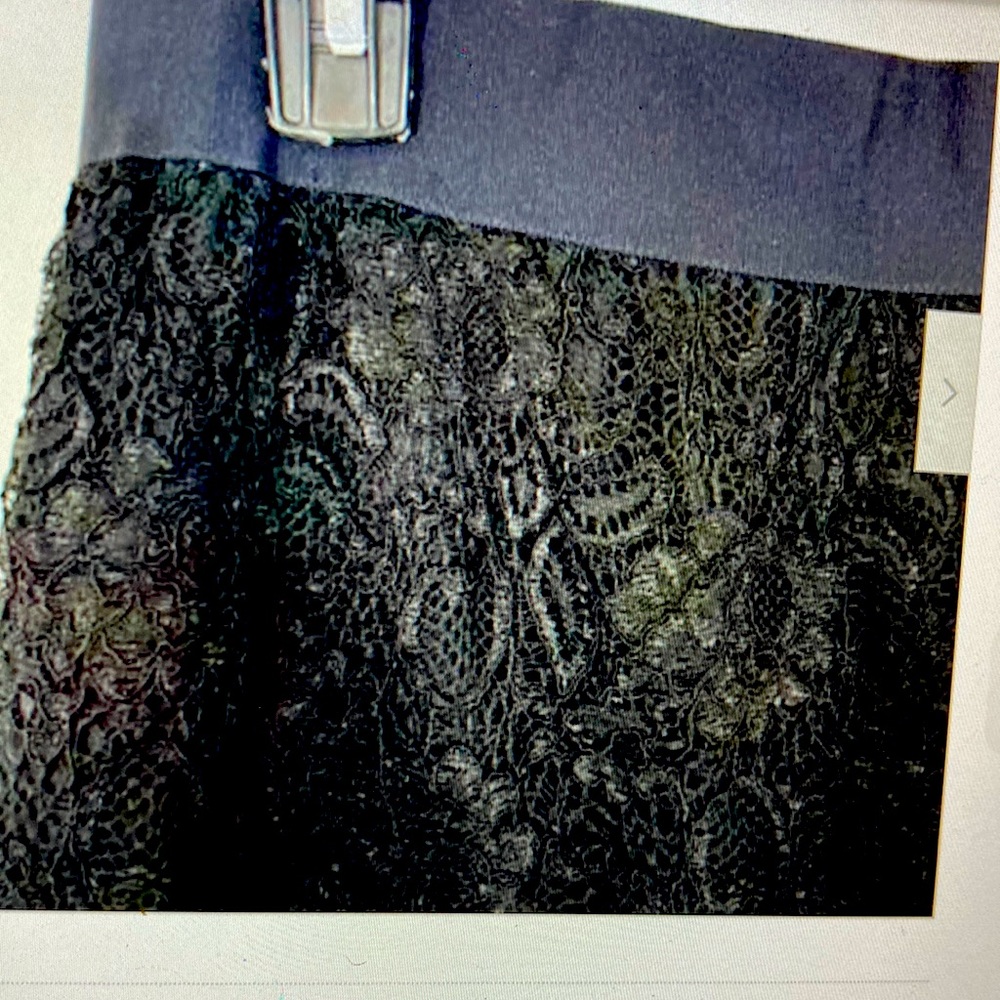 Anne Klein black skirt with lace overlay.  Short length, scalloped hem. Size 10.